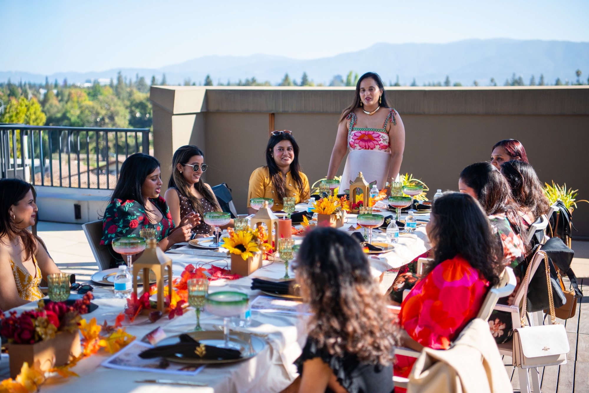 Guests in conversation at a supper club